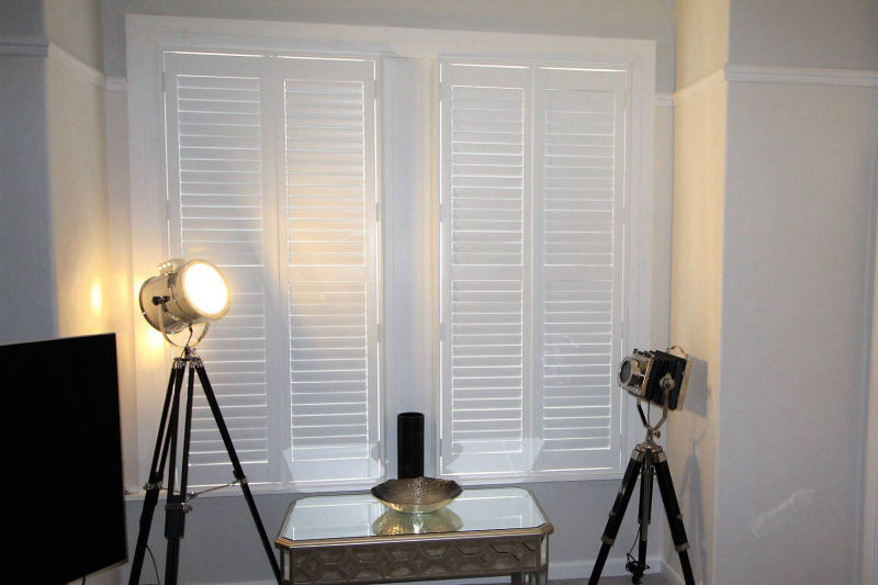 White wooden shutter, inside, closed