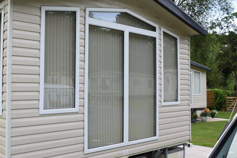 Vertical blinds give privacy as well as great control over the light entering the room