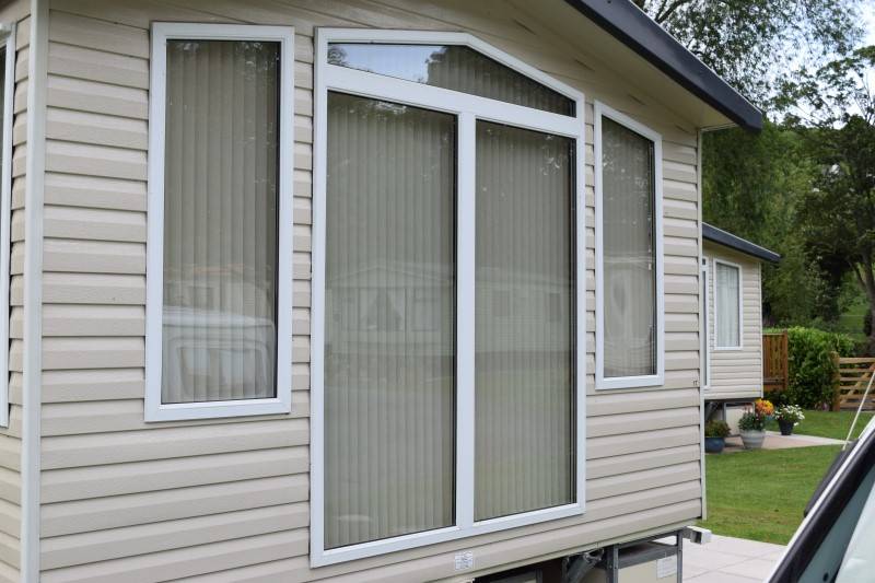 Vertical blinds give privacy as well as great control over the light entering the room